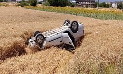 Bursa'da buğday tarlasına uçan otomobilin sürücüsü yaralandı