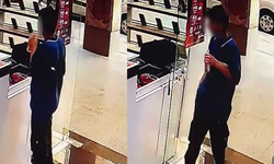 Bursa'da telefon hırsızlığı: Elini kolunu sallayarak çaldı