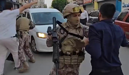 Kuytul çiftine gözaltıyı engellemek için polis aracının önüne yatmaya çalıştılar