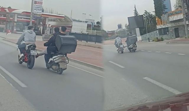 Bursa'da bozulan motosikleti böyle çekti