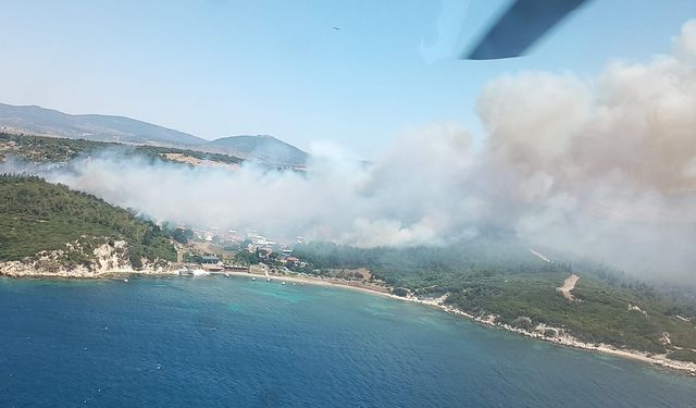 İzmir Menderes ilçesindeki yangın sonucu 1'i ağır 12 kişi hastaneye kaldırıldı