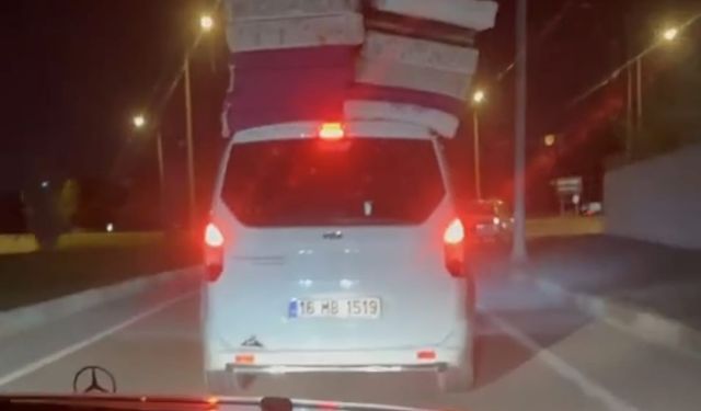 Bursa'da aracının üzerine yatakları dizen sürücü tehlike saçtı