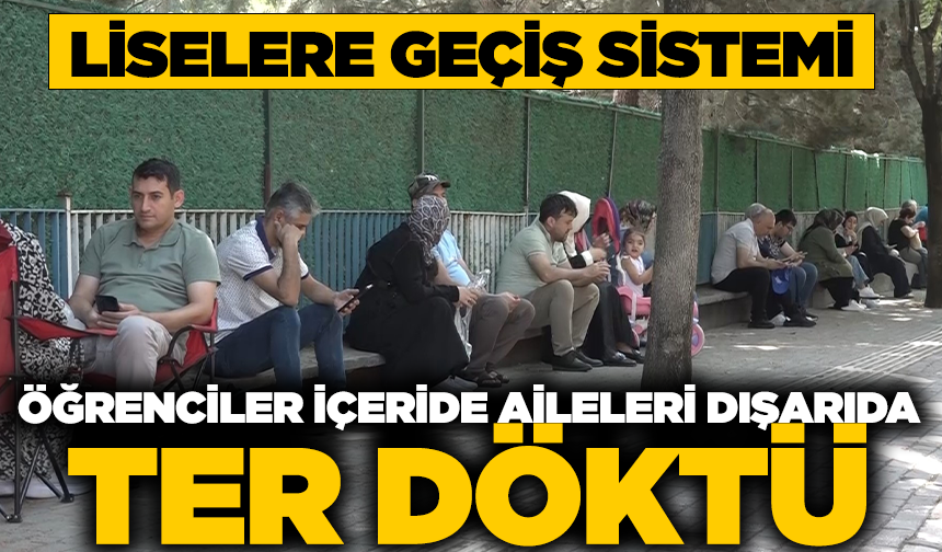 Öğrenciler içeride, aileleri dışarıda ter döktü