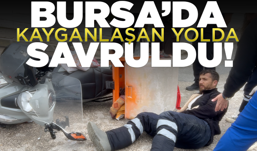 Bursa'da motosikletli kurye kayganlaşan yolda savruldu